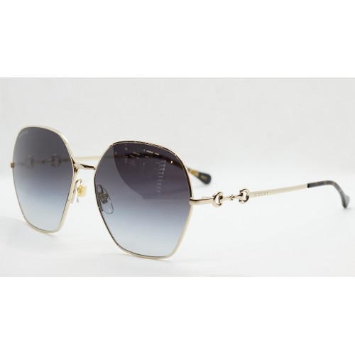Gucci Okulary przeciwsłoneczne damskie GG1335S 001 - złoty, filtr UV400
